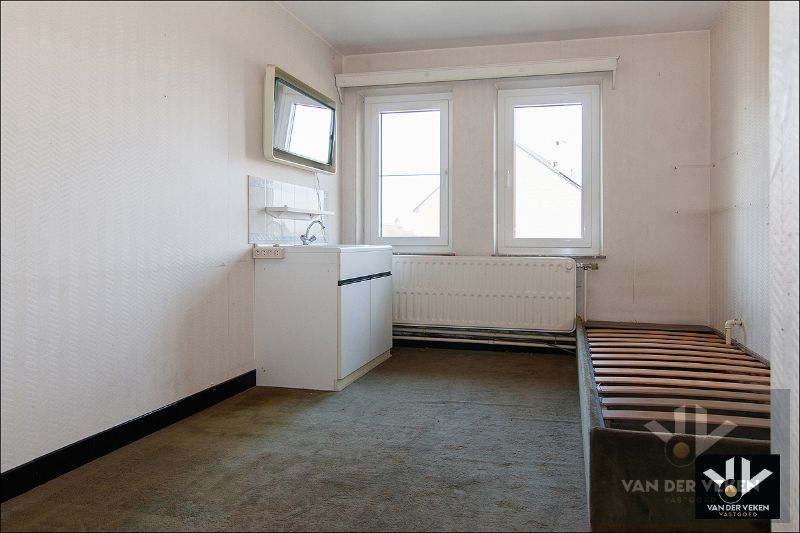 Multifunctioneel eigendom met 2 wooneenheden op een riant perceel van 21 aren 83 centiaren op een goed bereikbare, rustige locatie in Diepenbeek foto 24