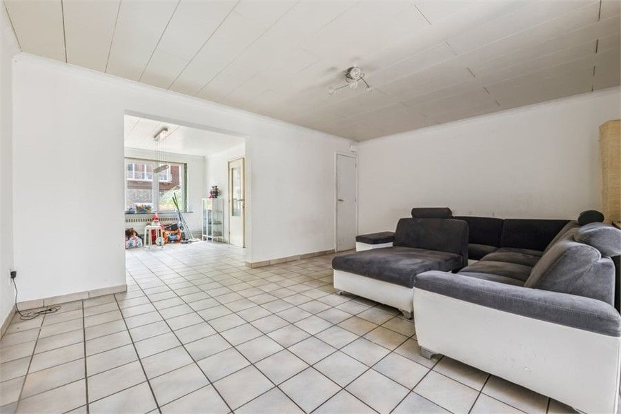 KNUSSE GEZINSWONING MET GEZELLIGE STADSTUIN IN HASSELT foto 9