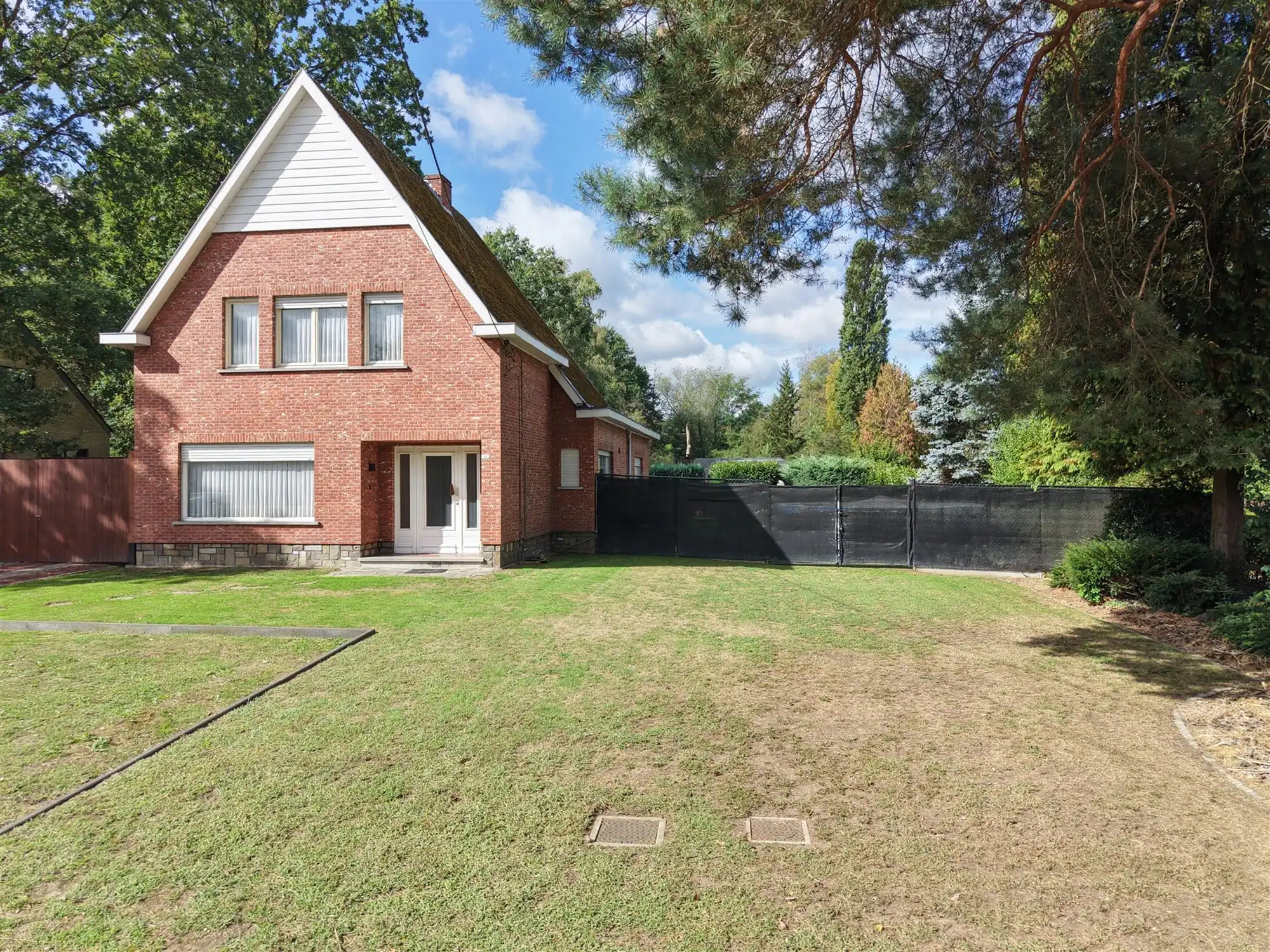 Hoofdfoto van de publicatie: Te renoveren woning op een perceel van 14 are 75 in Baal