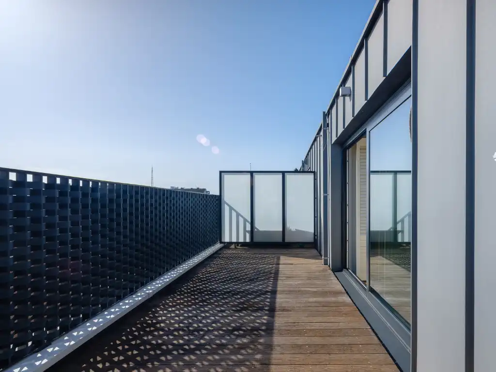 Ruim en lichtrijk duplexappartement met 2 slaapkamers, meerdere terrassen en staanplaats aan Ter Platen foto 16