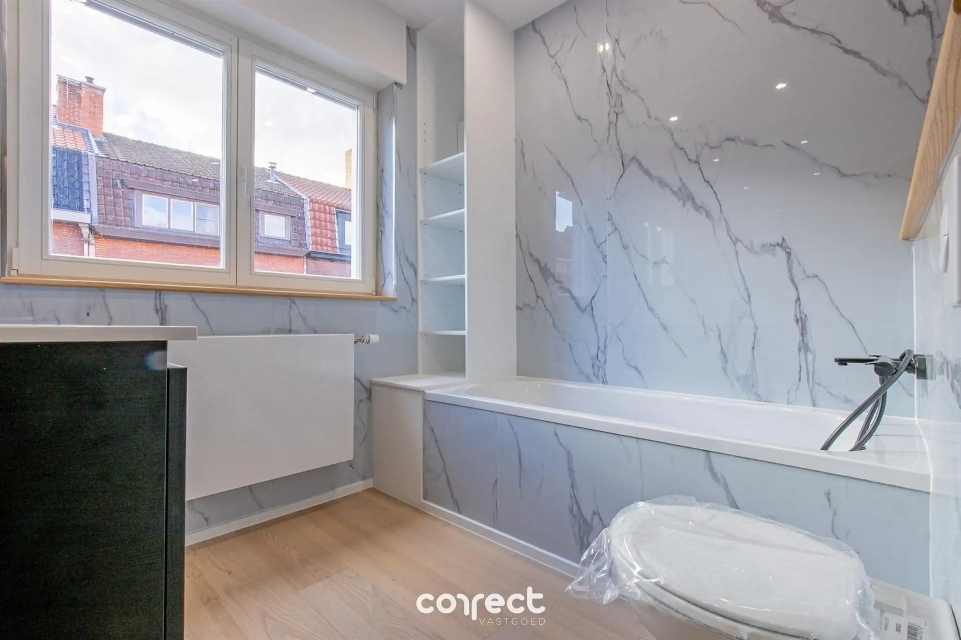 Prachtig gerenoveerde stadswoning met tuin foto 18