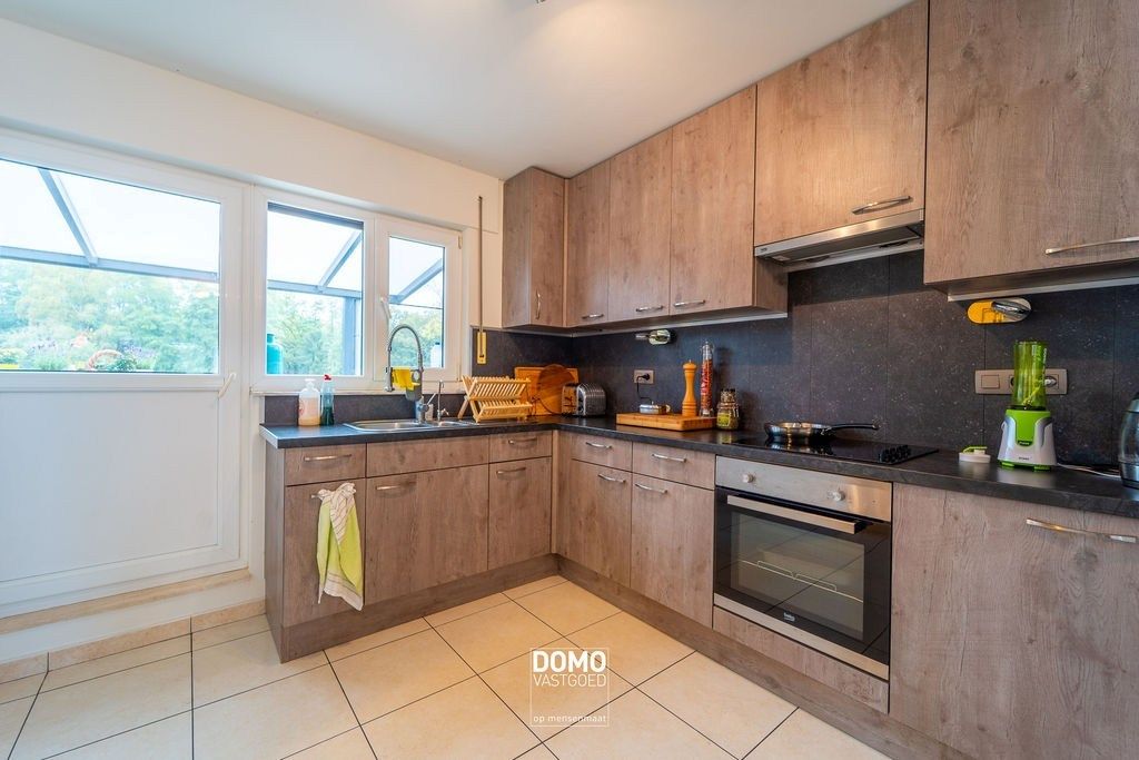 INSTAPKLAAR DUPLEXAPPARTEMENT MET TERRAS EN AUTOSTANDPLAATS IN HEUSDEN-ZOLDER foto 4