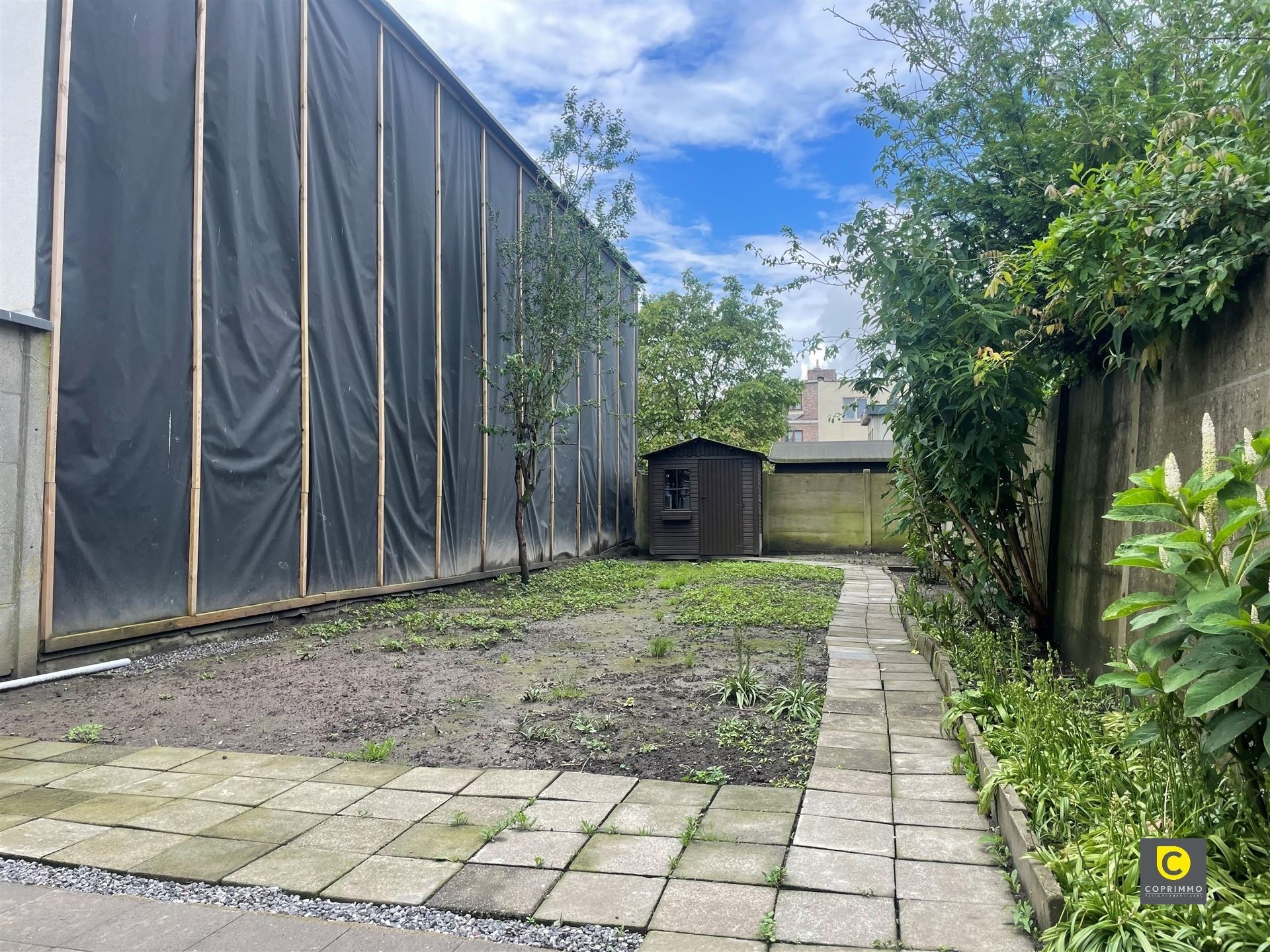 Gelijkvloers app. met ruime tuin  foto 3