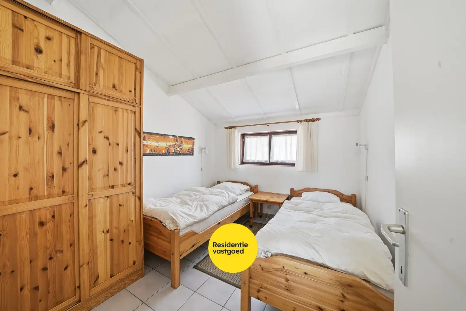 Instapklare vakantiewoning met zonnige tuin en 2 slaapkamers foto 8