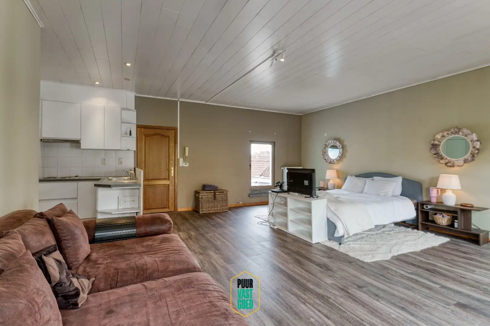 Handelsruimte met achteruitgang en 2 appartementen! foto 25