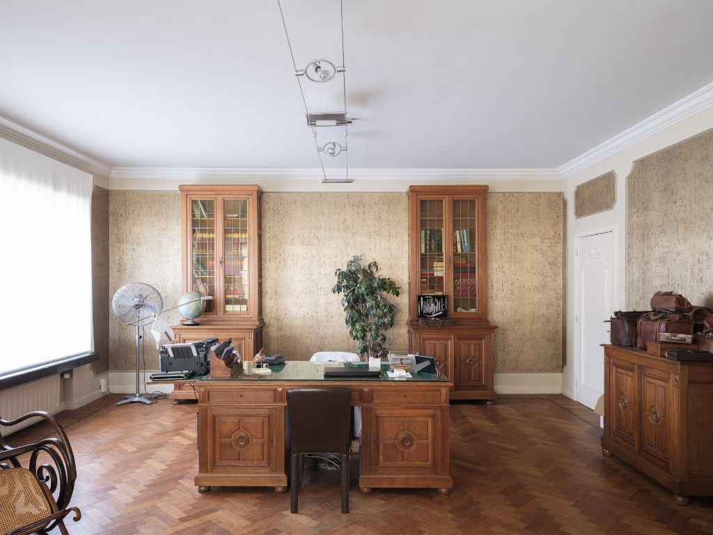 Voormalige dokterswoning met praktijkruimte en stadstuin foto 8