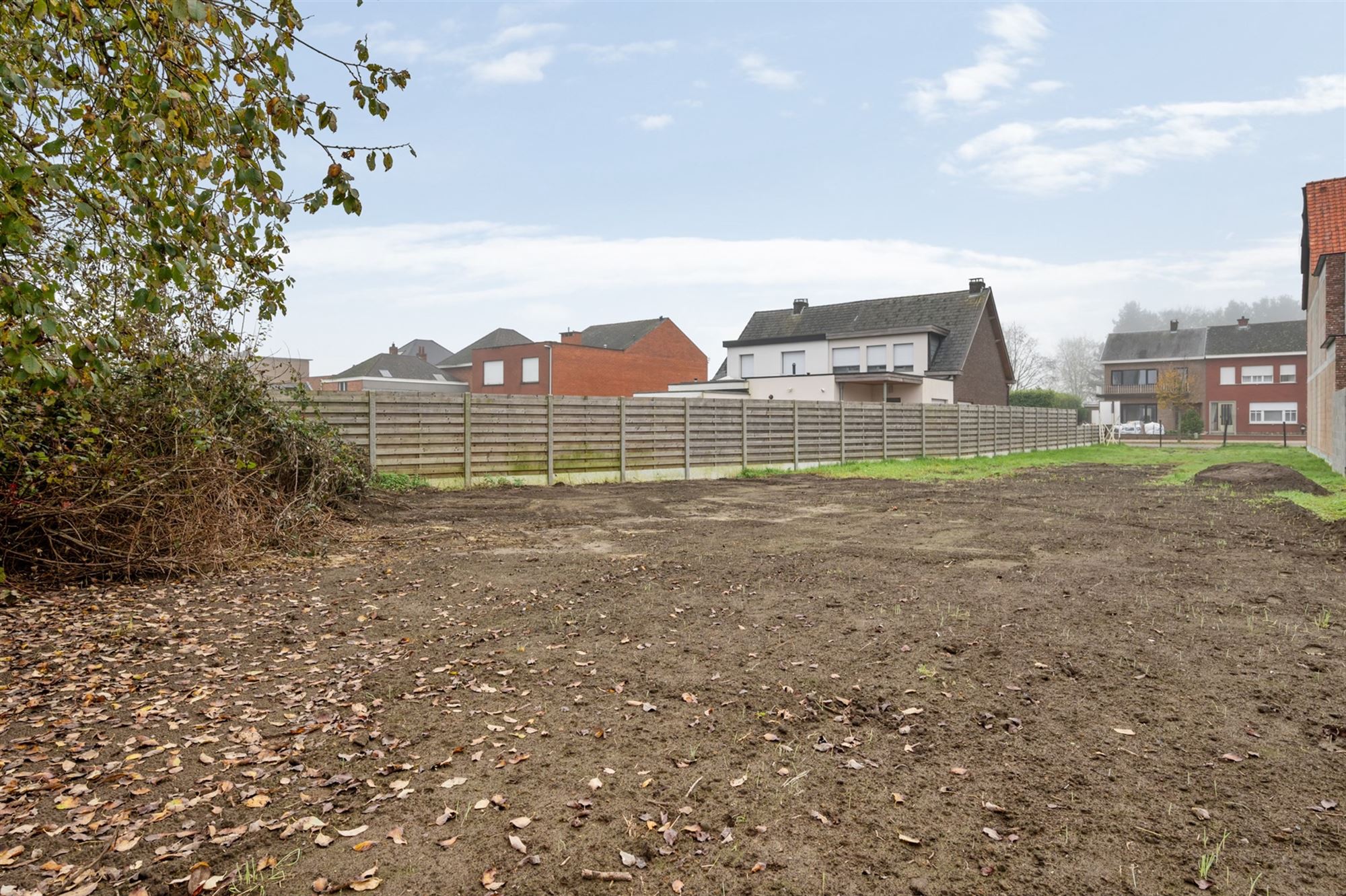 Perceel bouwgrond (650 m2) voor half open bebouwing niet ver van het centrum foto 7