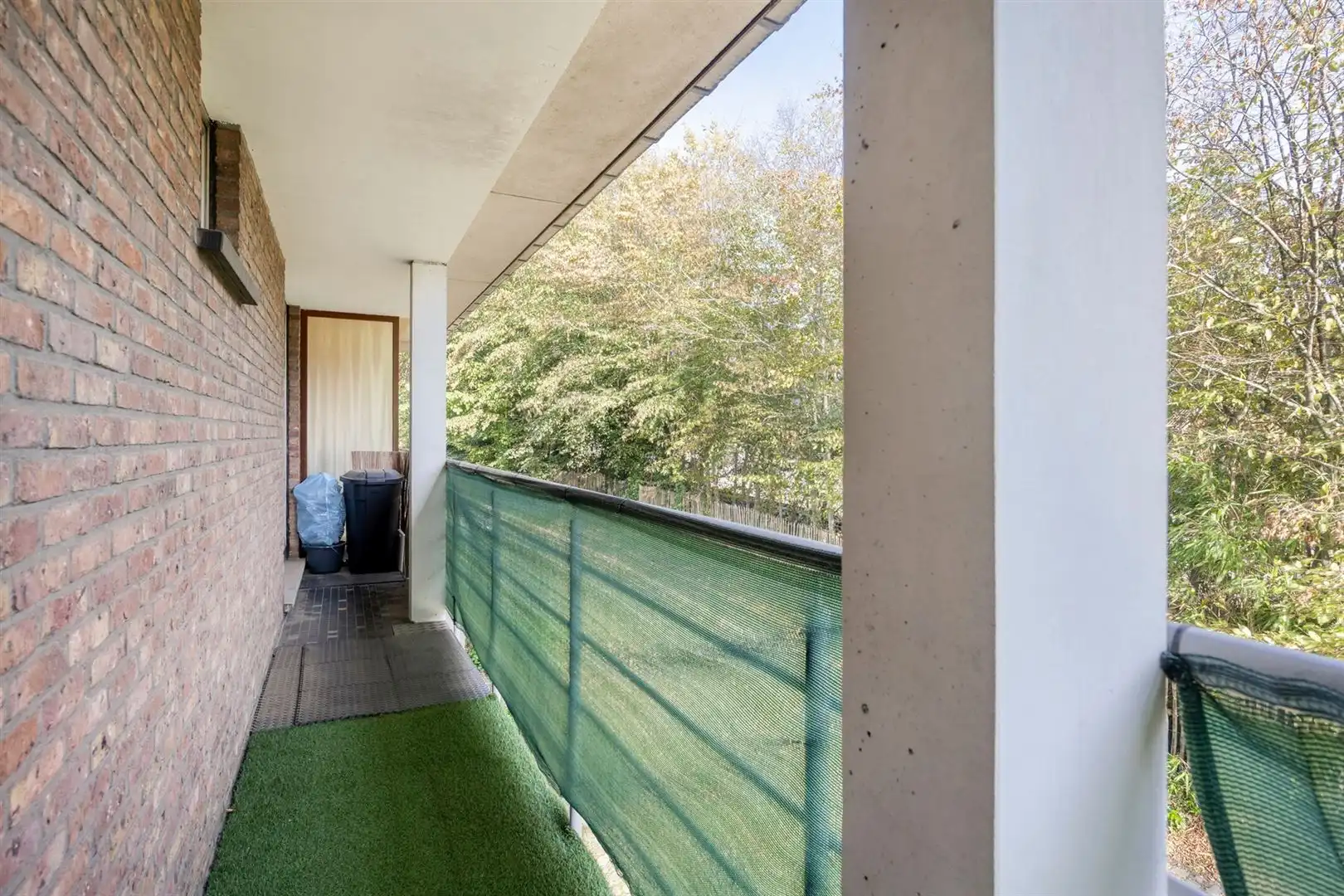 TE KOOP: Gerenoveerd appartement met 2 slaapkamers, terras en garage te Heusden! foto 10