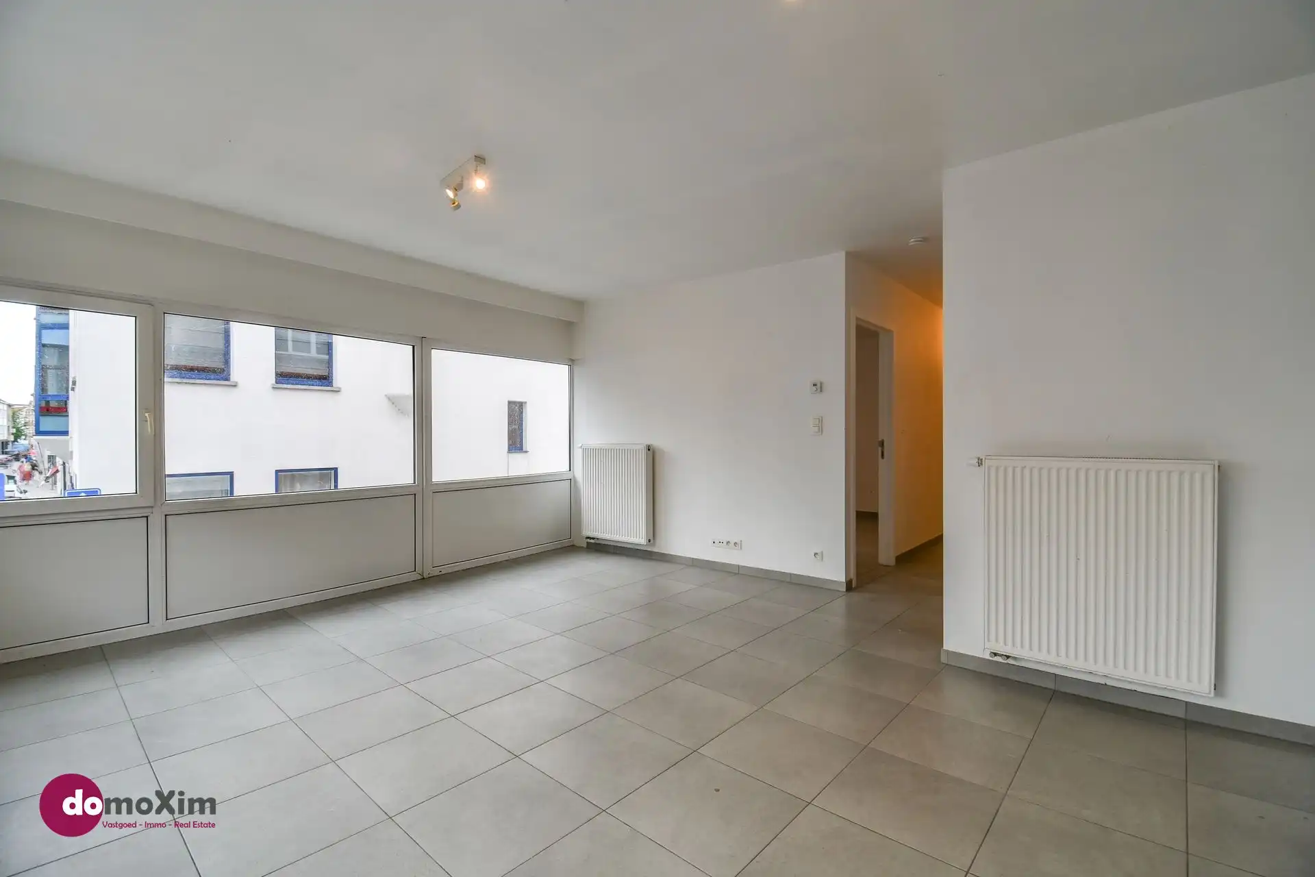 Opbrengsteigendom met 3 appartementen en handelsruimte in het centrum van Mechelen foto 4