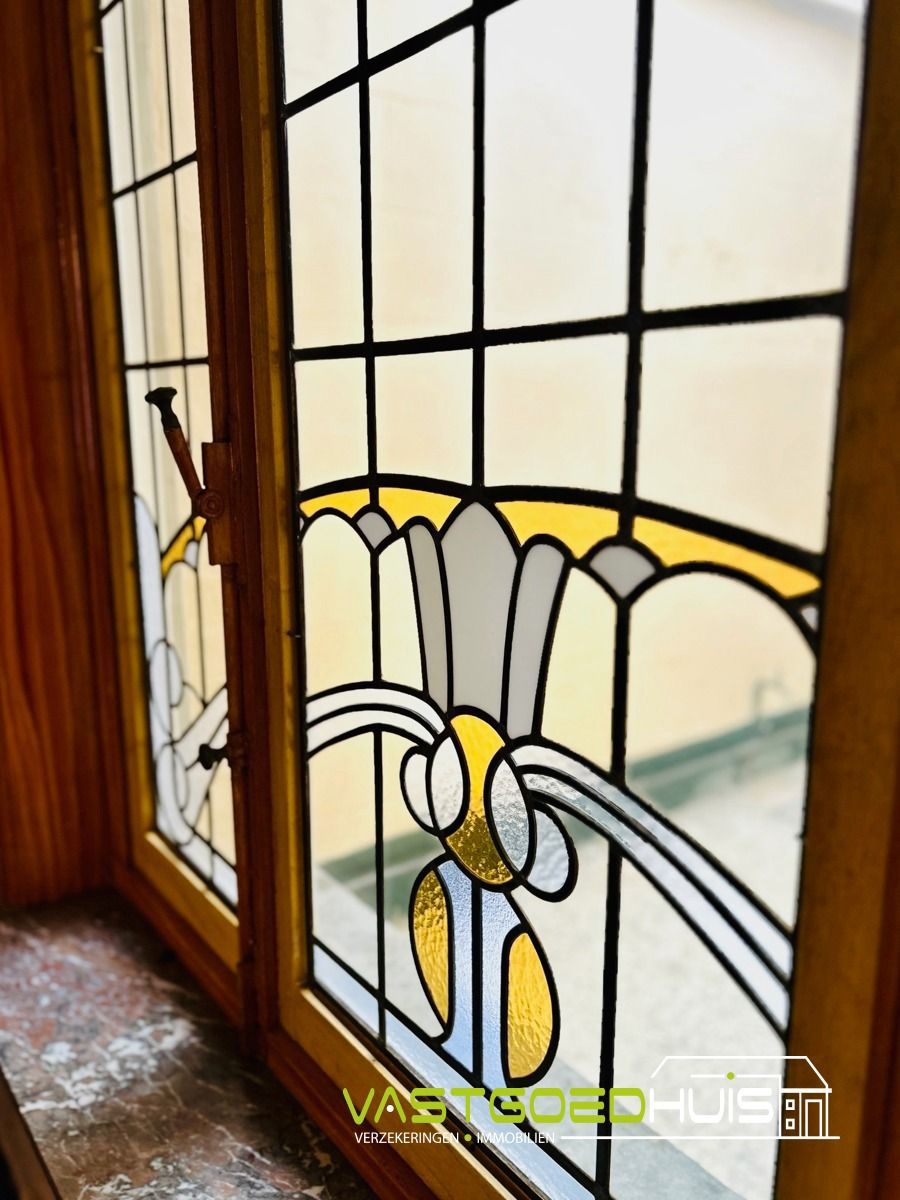 Karaktervolle gezinswoning met authentieke details in Ninove foto 11