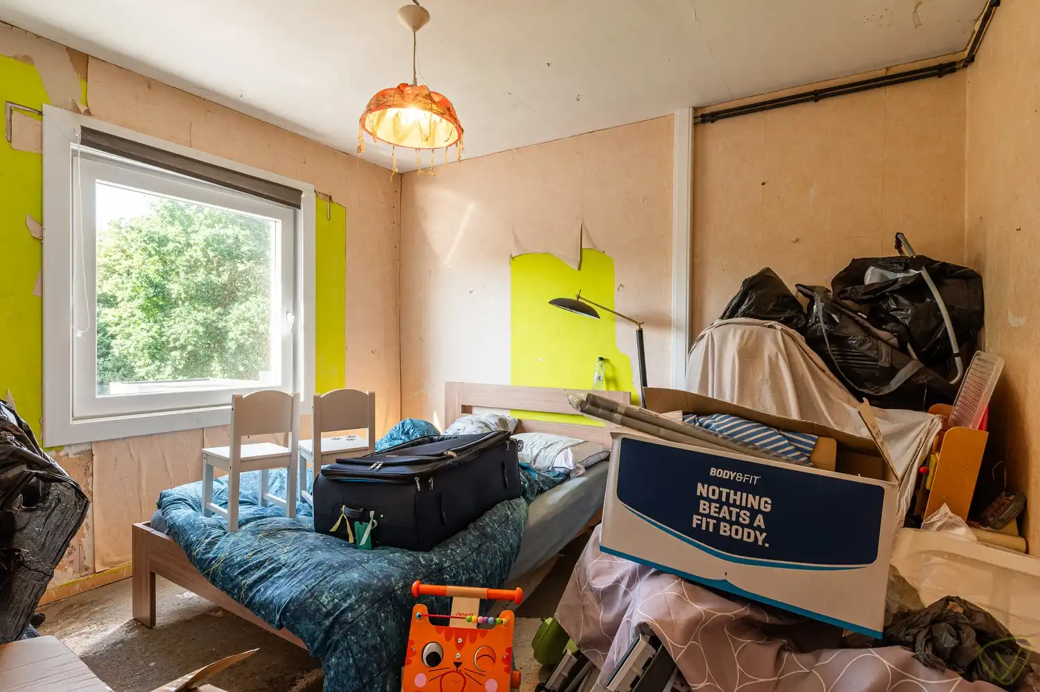 Te renoveren gezinswoning met grote tuin in het centrum van Bassevelde foto 13