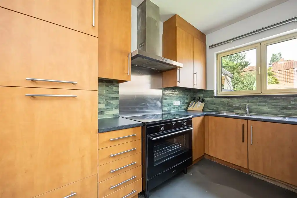 Instapklare woning met zonnige tuin dichtbij Rivierenhof foto 10
