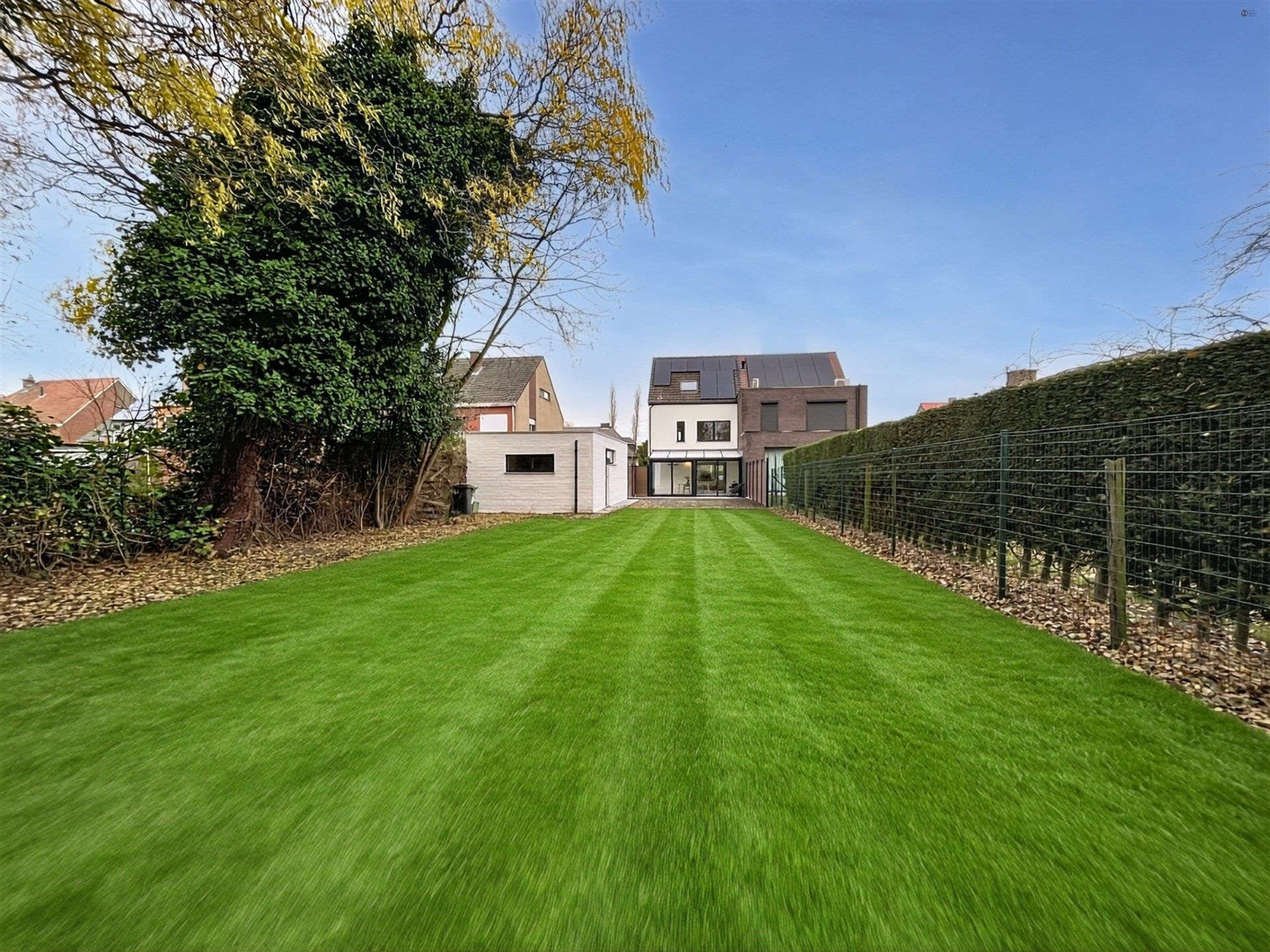 Energiezuinige gezinswoning met 4 slpk op een perceel van 610 m² foto 2