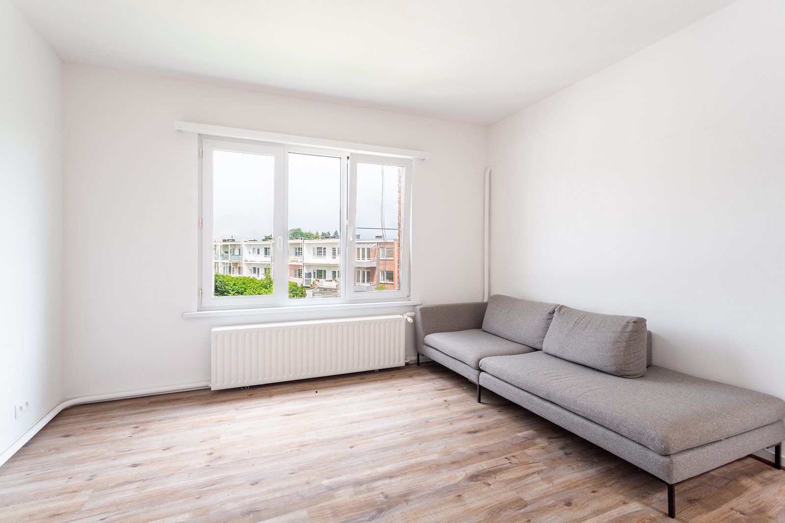 Licht en ruim appartement in rustige straat foto 12