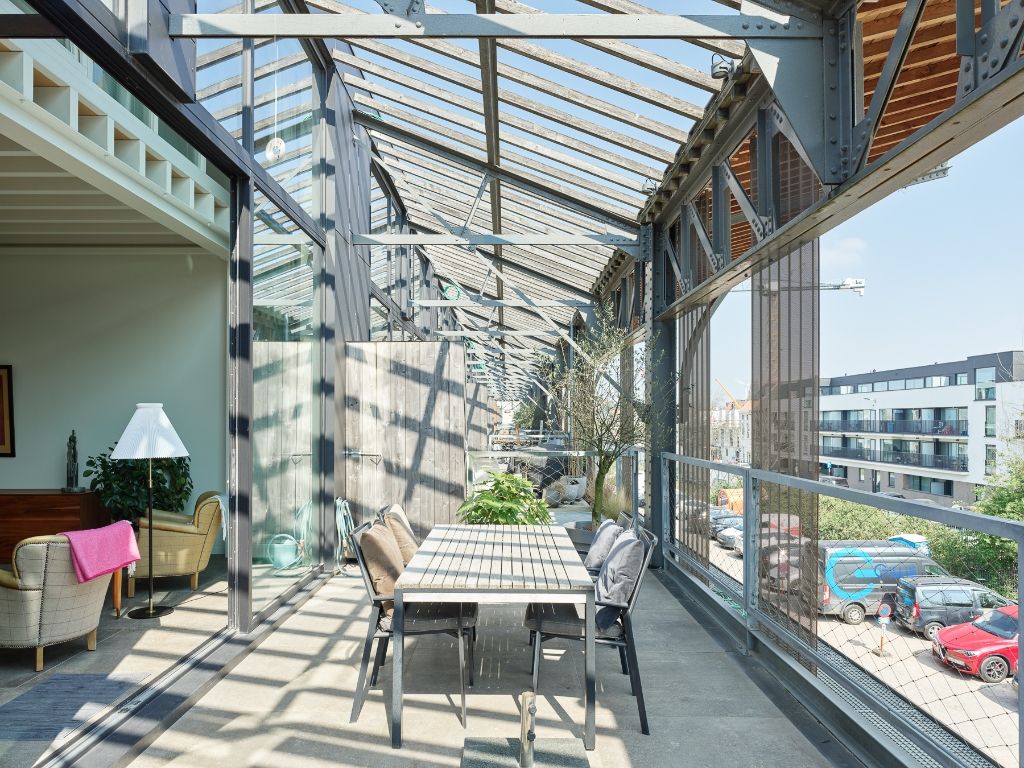 Luxueus en tijdloos – Exceptionele loft met 2 slaapkamers (mogelijkheid tot 3), ontworpen door ‘Plano Architecten’, in een beschermd gebouw met een rijkelijke industriële voorgeschiedenis. foto 6