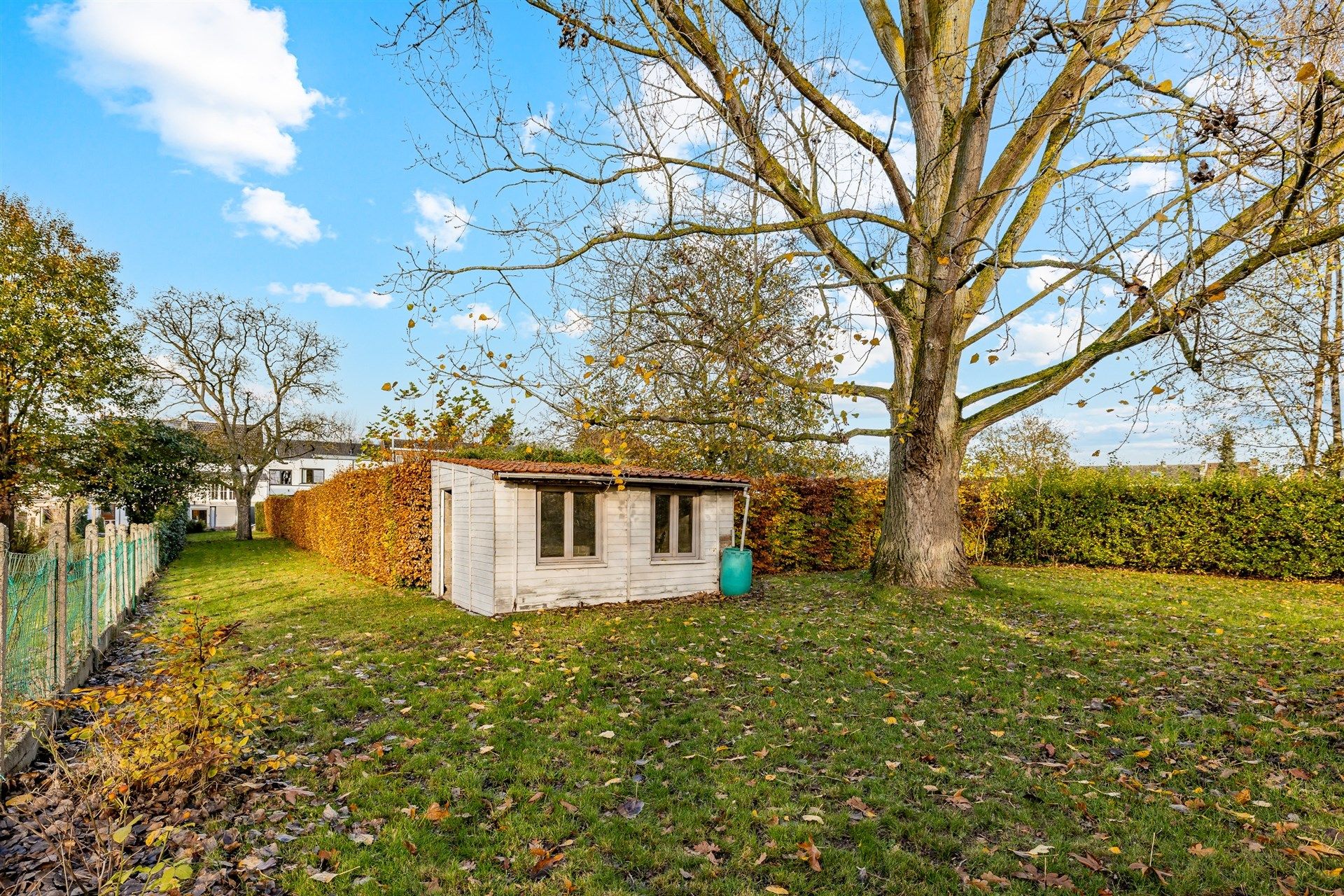 Gezellige rijwoning met uitzonderlijke grote tuin en externe garage in hartje Schellebelle foto 26