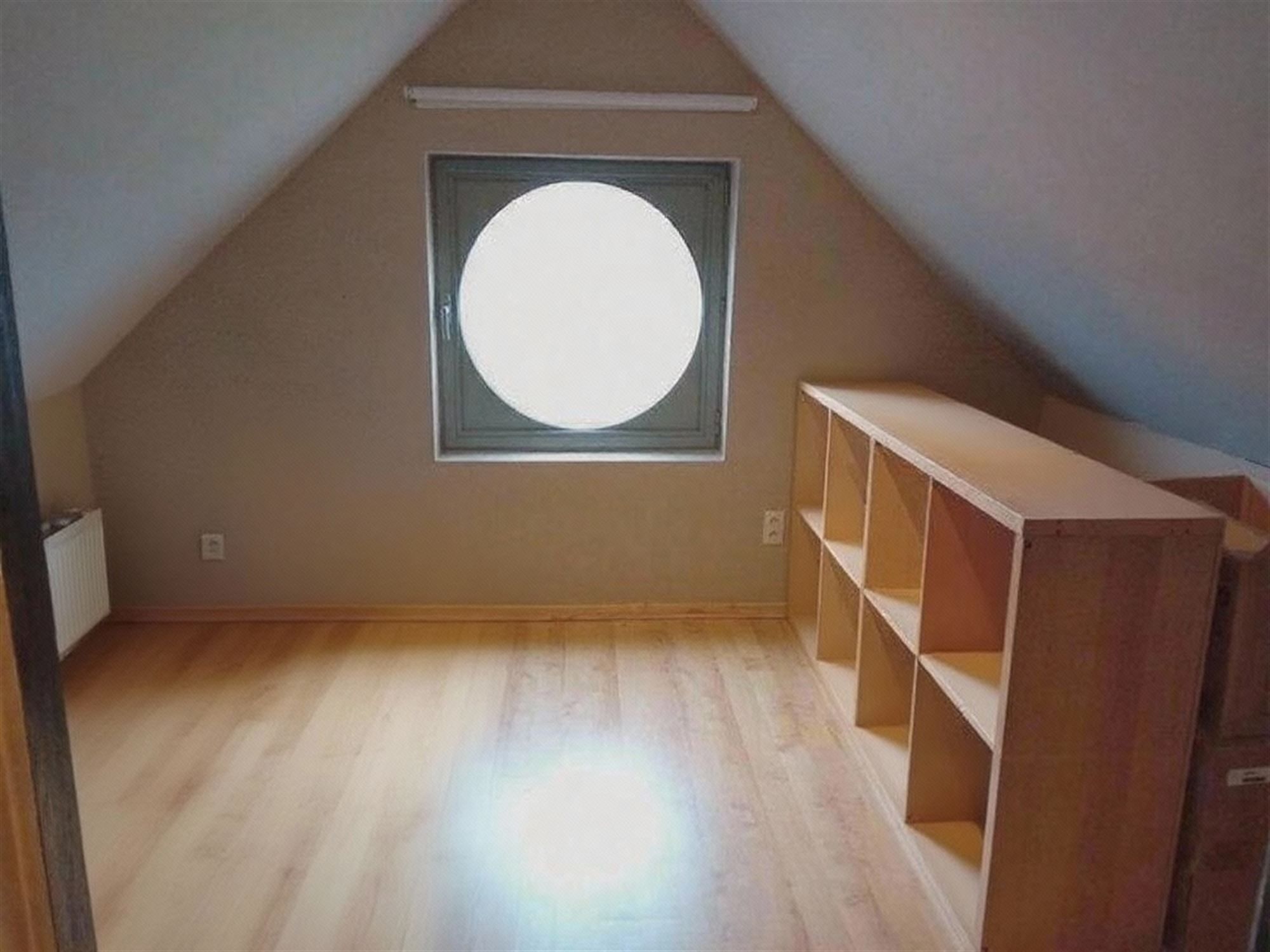 Rustig gelegen woning met 3 slaapkamers, garage en aangename tuin foto 11