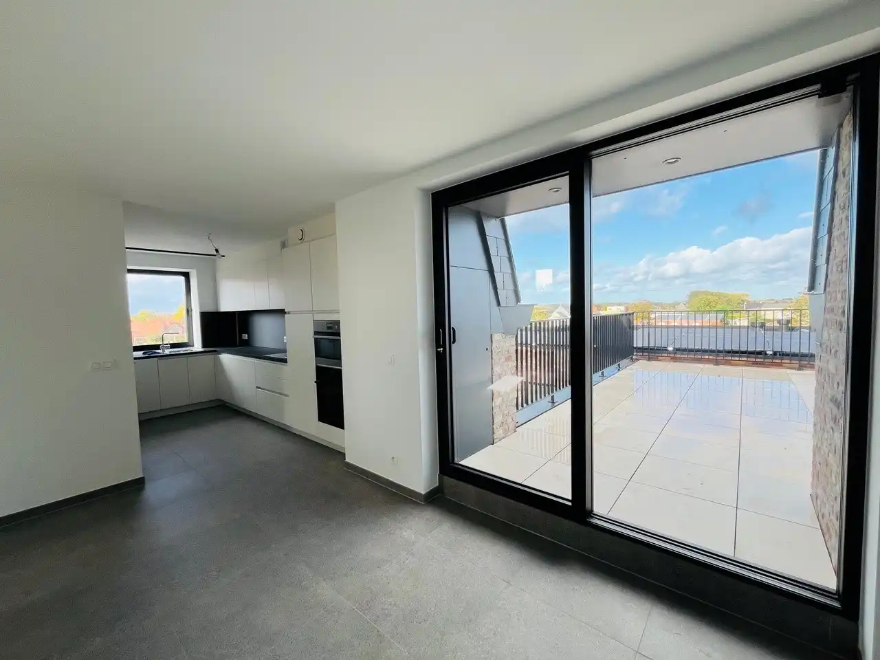 Prachtig 3-slaapkamerappartement met staanplaats in het voormalige gemeentehuis van Vleteren foto 4