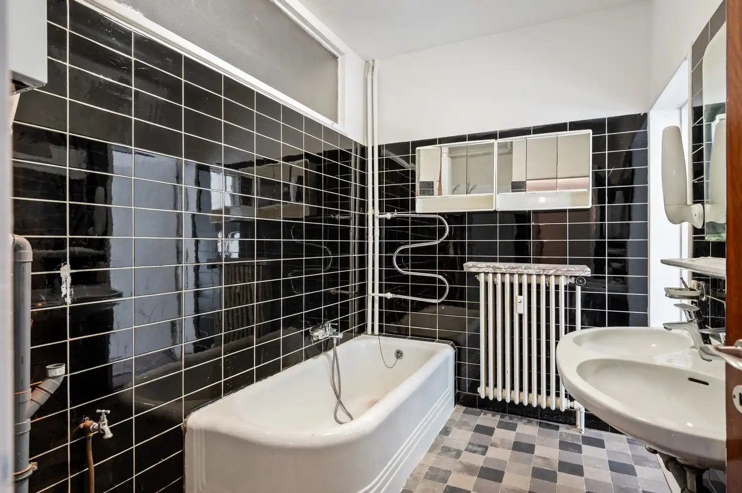 Ruim gelijkvloers appartement met 3 slaapkamers, tuin en garage! foto 12