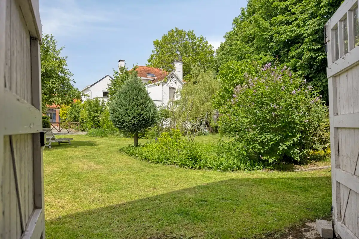 Bijzonder historisch herenhuis te koop in Heppen foto 59