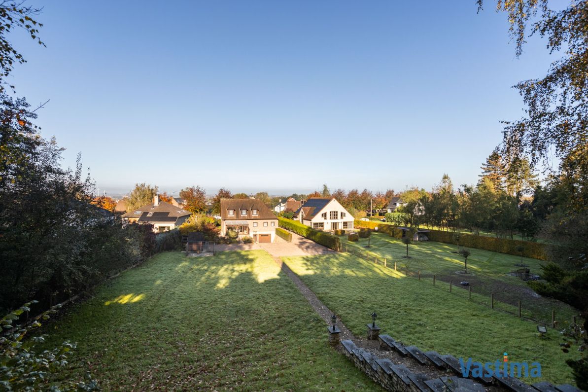 Statige villa met enorm potentieel in een prachtige groene omgeving foto 31