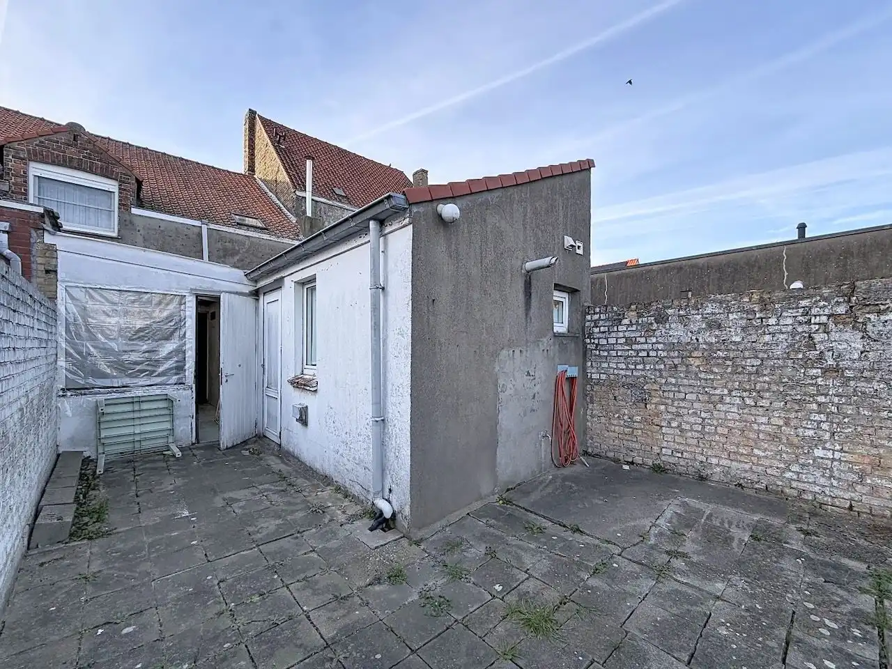 Charmante rijwoning met grote tuin en garage inhuis foto 23