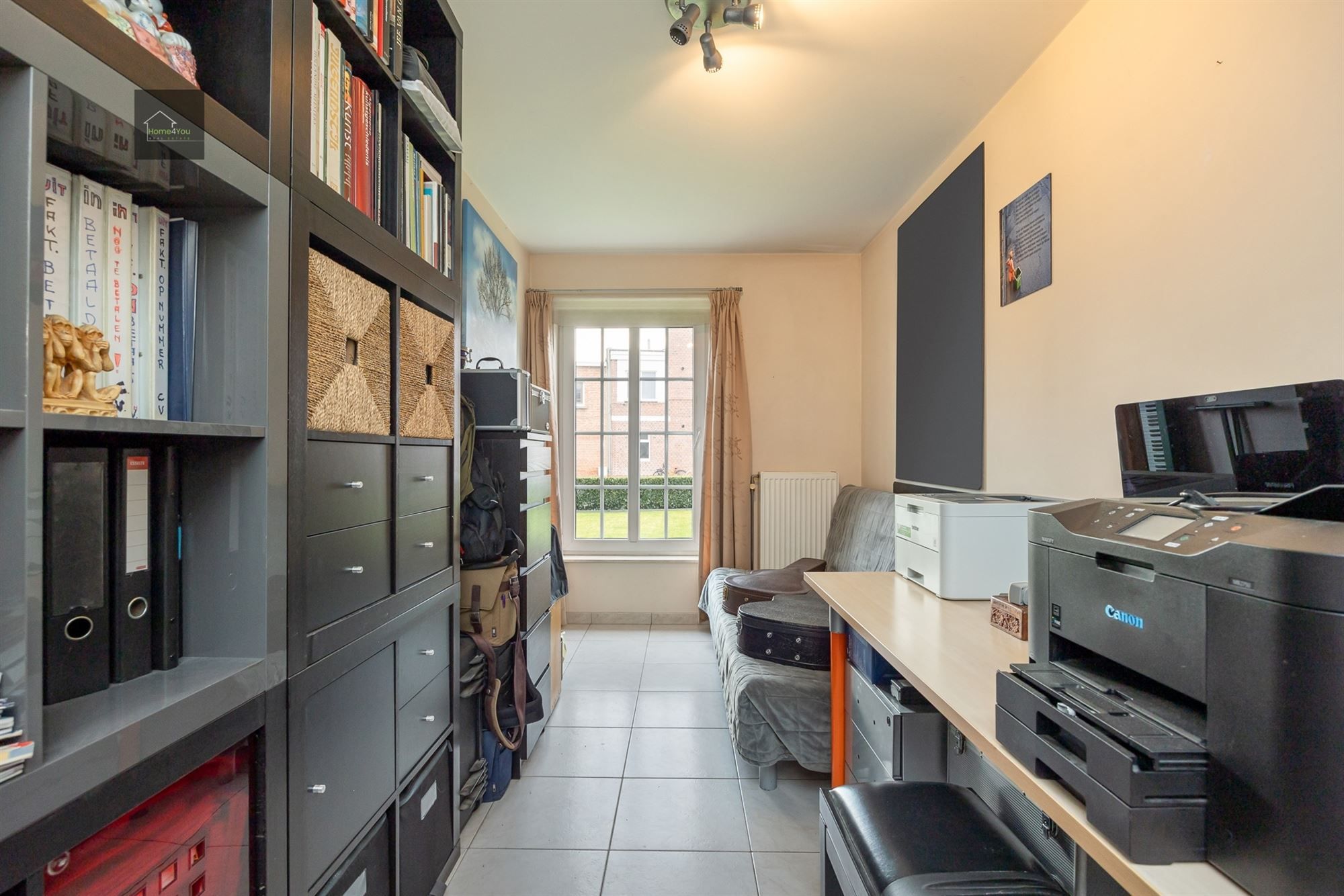 Ruim gelijkvloers appartement met tuin, parking en garagebox foto 13