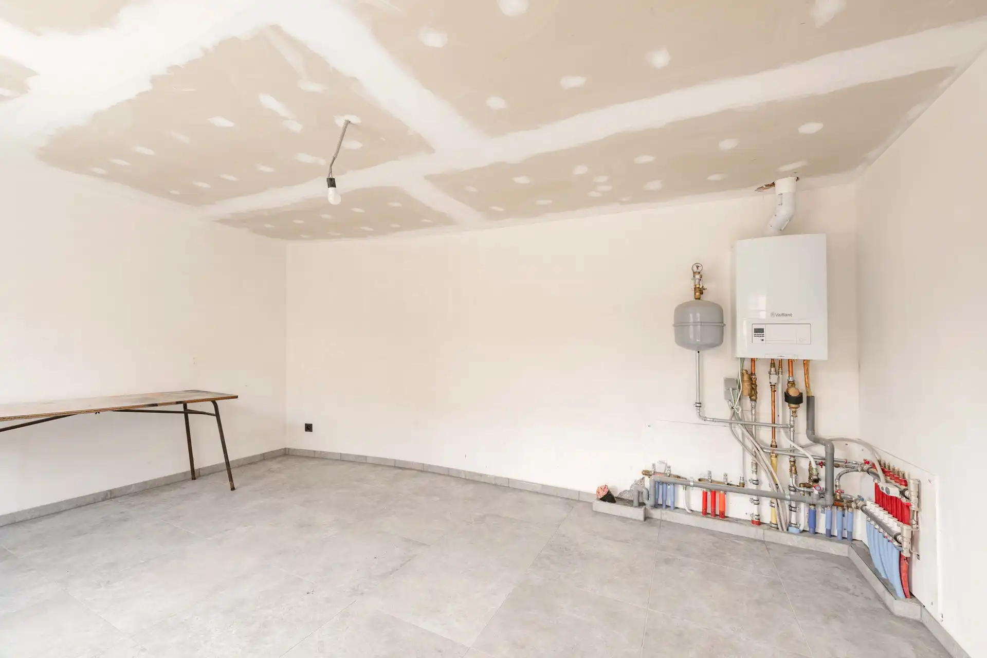 Prachtige tot in de puntjes gerenoveerde halfopen bebouwing met 3 slaapkamers, aparte garage en zuidgerichte tuin te koop in het hartje van Sint-Baafs-Vijve foto 28