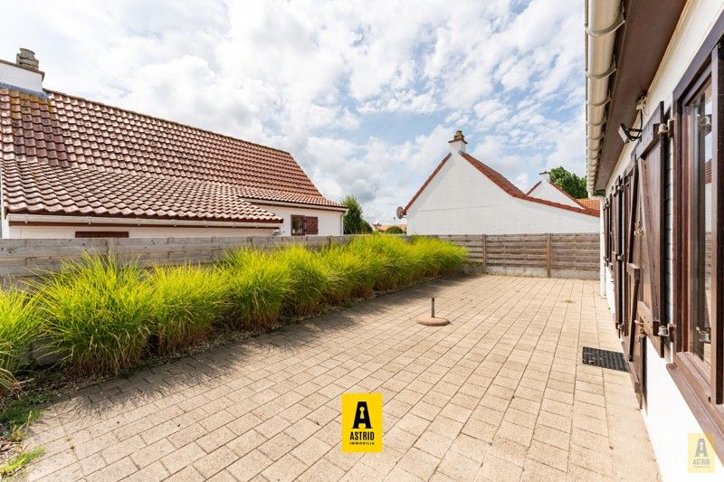 Fantastisch vissershuis met mooie zonnige tuin en parkeerplaats! foto 5