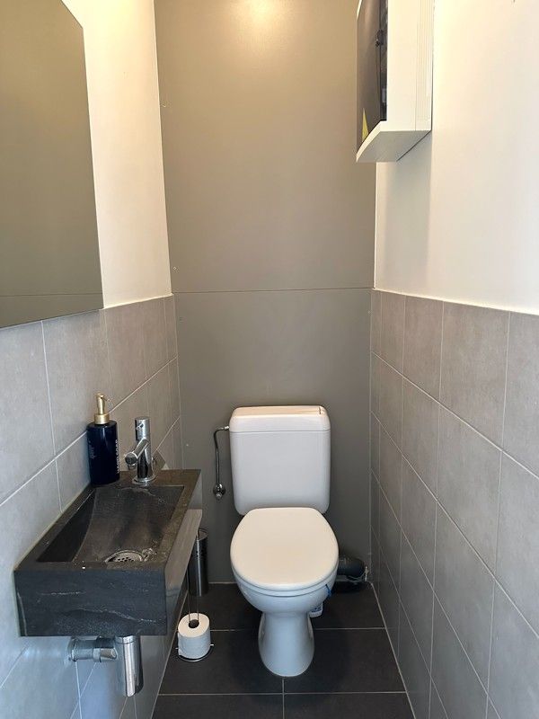 Lichtrijk 1-slaapkamer hoekappartement met zicht op groen - ideaal voor starters of als investering! foto 8