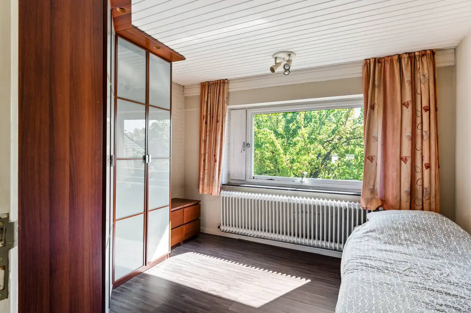 Lichtrijke 4slpk-woning met tuin en polyvalente ruimte foto 19