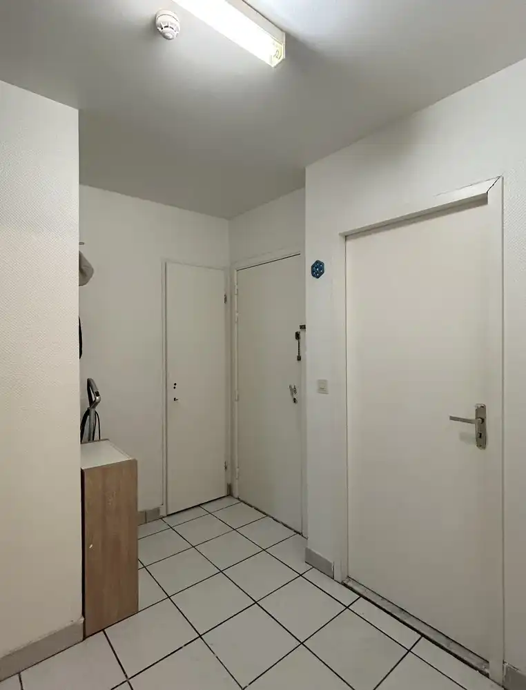 Op te frissen 1-slaapkamerappartement met autostaanplaats en kelder foto 2