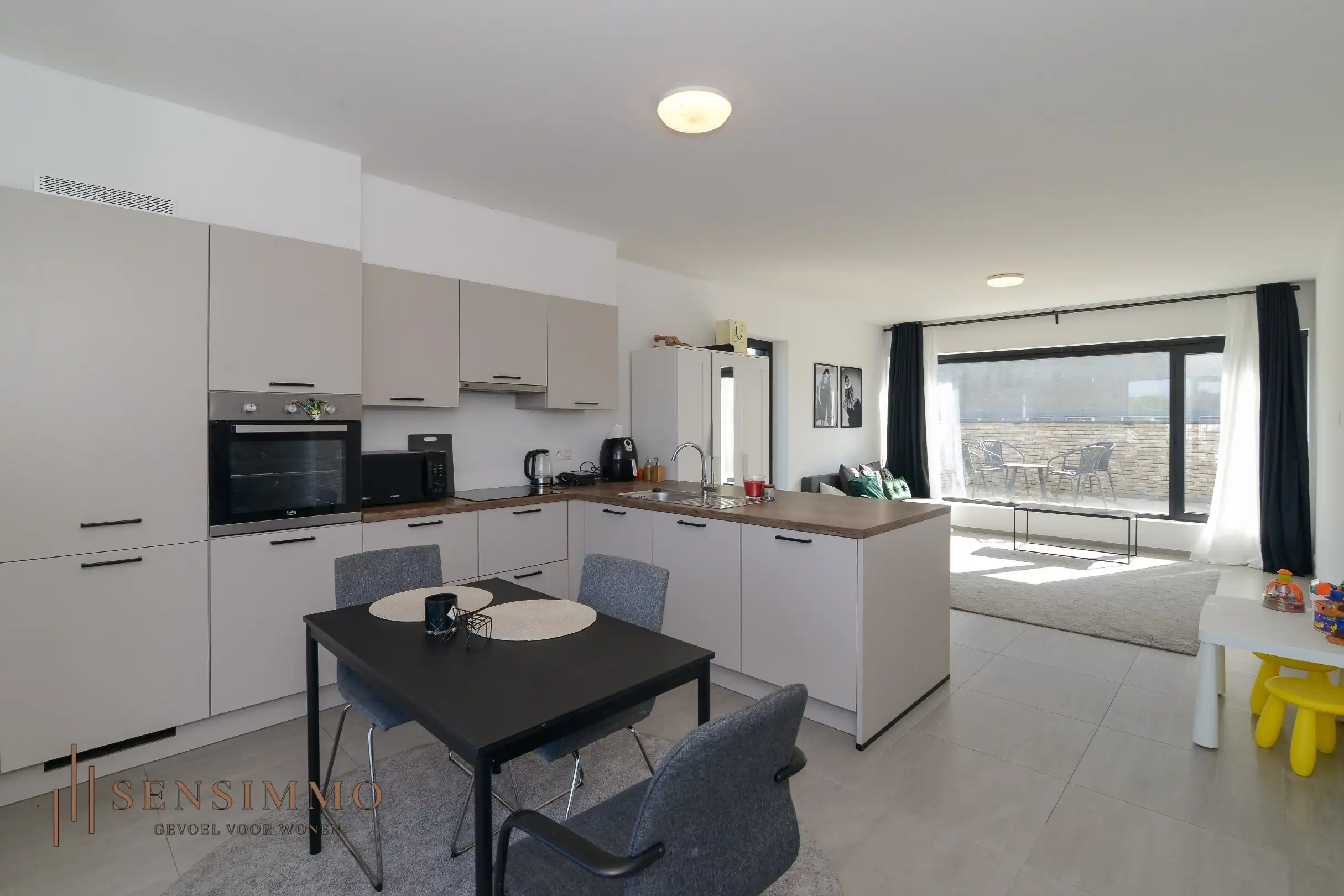 Instapklaar & energiezuinig 1-slaapkamerappartement met 2 terrassen en parking in Maasmechelen foto 3