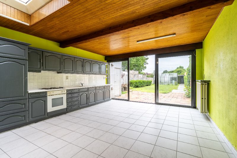 Ruime en veelzijdige rijwoning met garage achteraan en aparte ingang foto 7