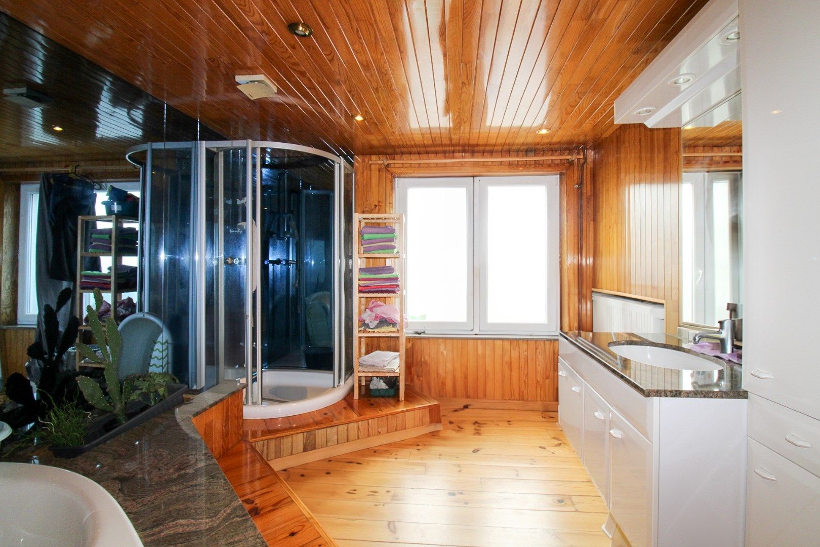 Veelzijdig handelshuis met woonst en luxueuze B&B op toplocatie aan de Markt van Temse! foto 32