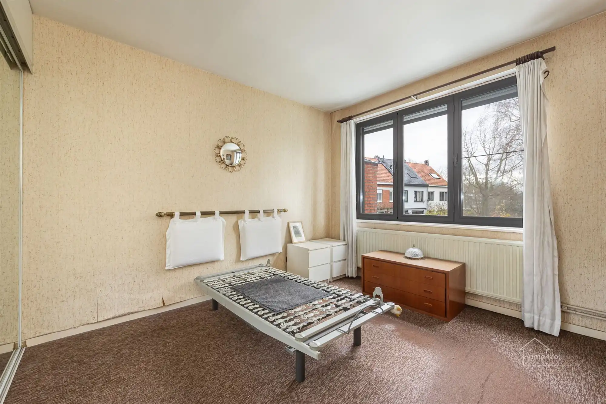 Ruime rijwoning op toplocatie met zongerichte tuin foto 14