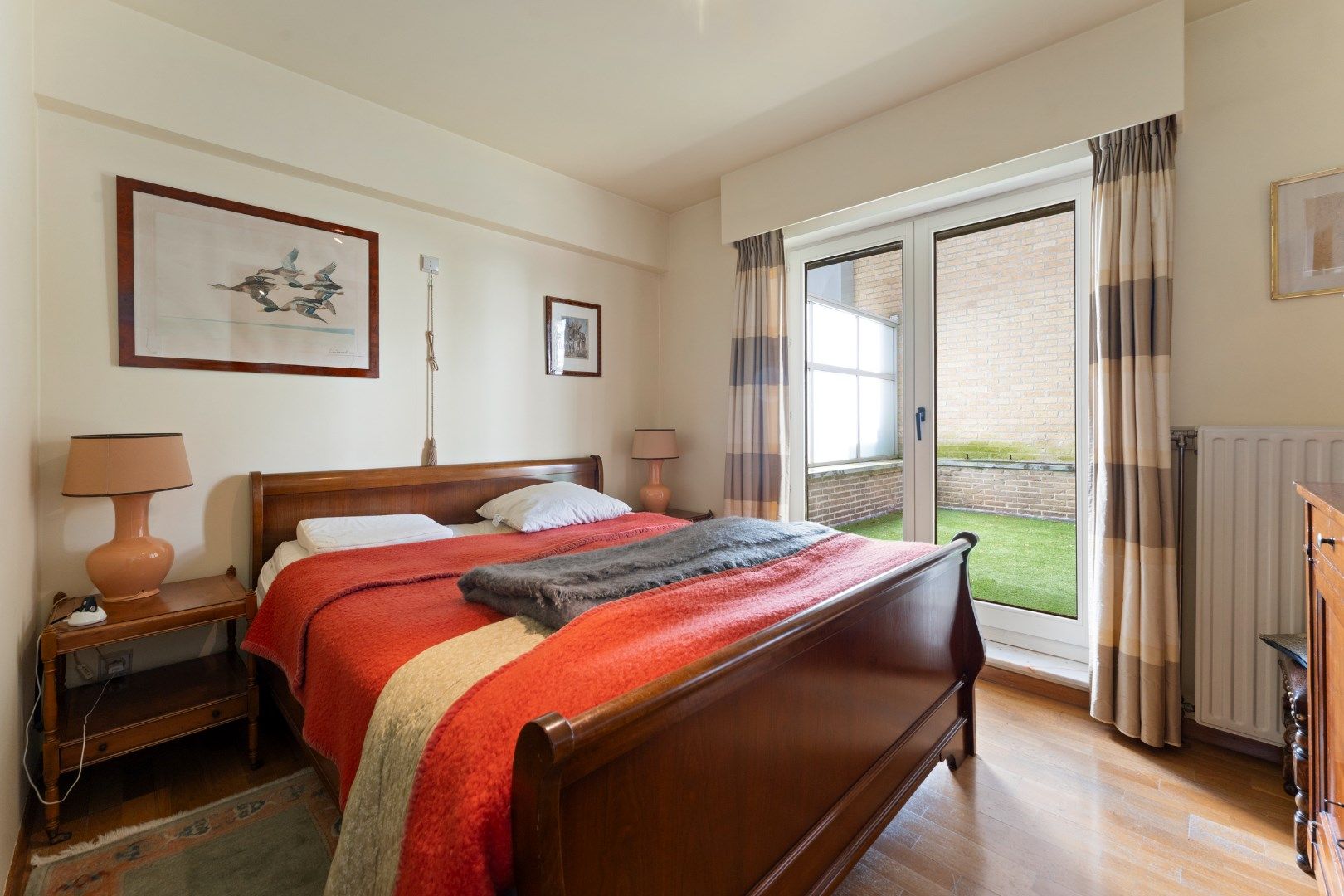 Breed hoekappartement met groot terras foto 13