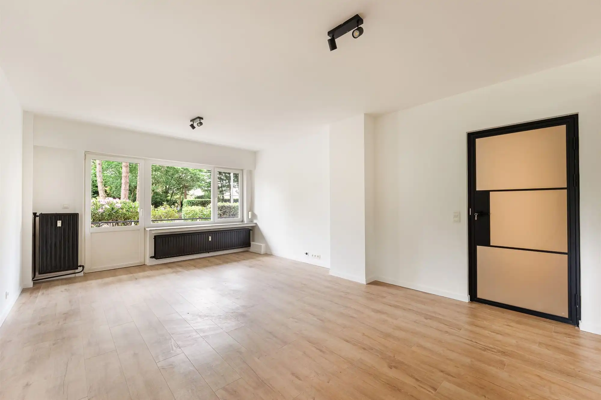 Lichtrijk gelijkvloersappartement met 2 slpk op TOPlocatie foto 7