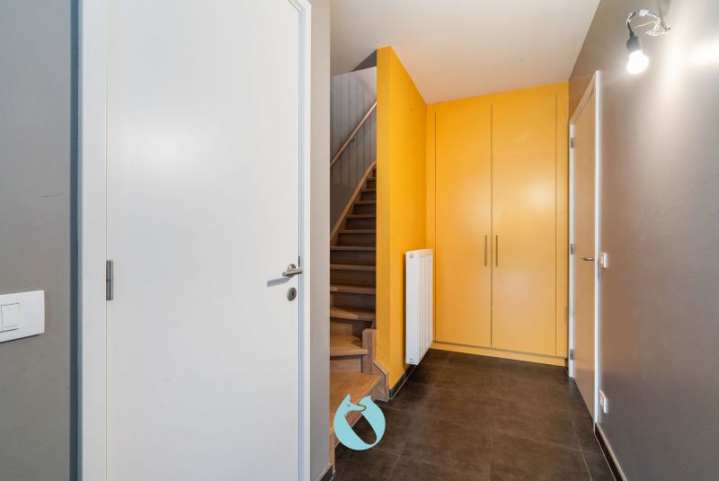 Deze woning is rustig gelegen in woonerf Brielken te Evergem foto 2