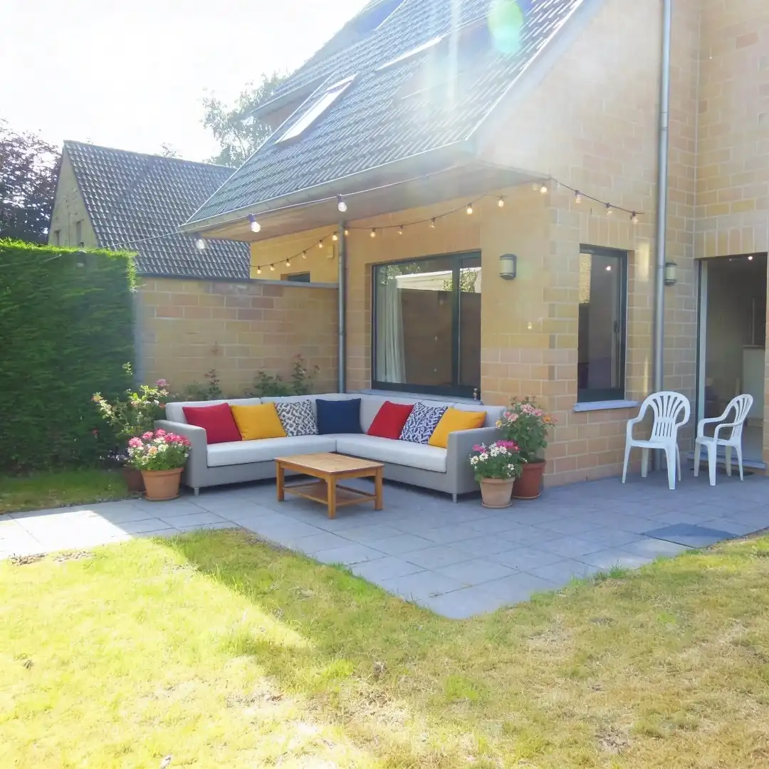 Gezellig gelijkvloersappartement met zonnige tuin en garage foto 2