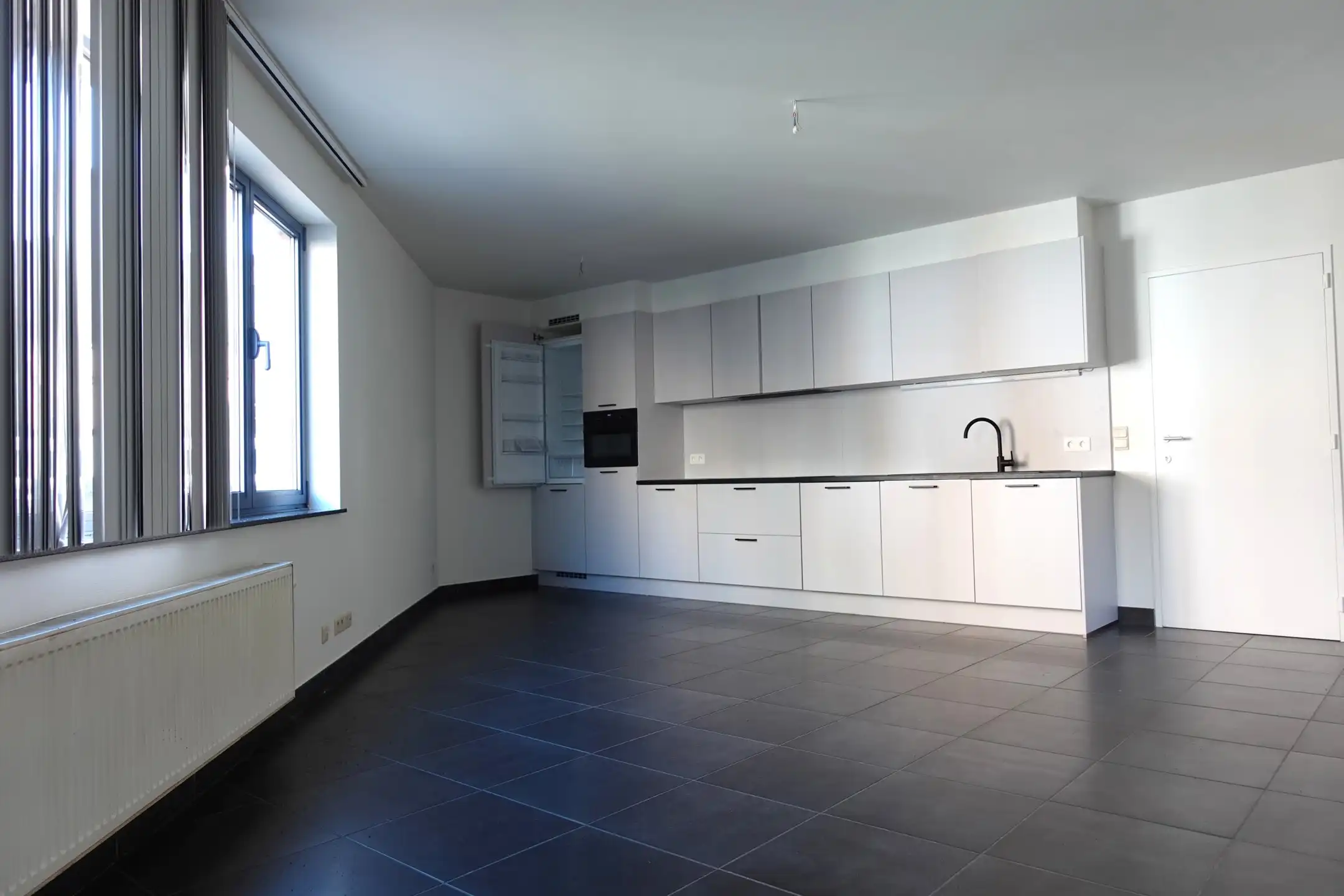 Ruim 2-slaapkamer appartement met stadstuin te Turnhout. foto 2