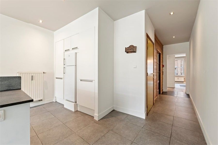 RUIM INSTAPKLAAR APPARTEMENT MET RUIM TERRAS IN HET CENTRUM VAN SINT-TRUIDEN foto 15