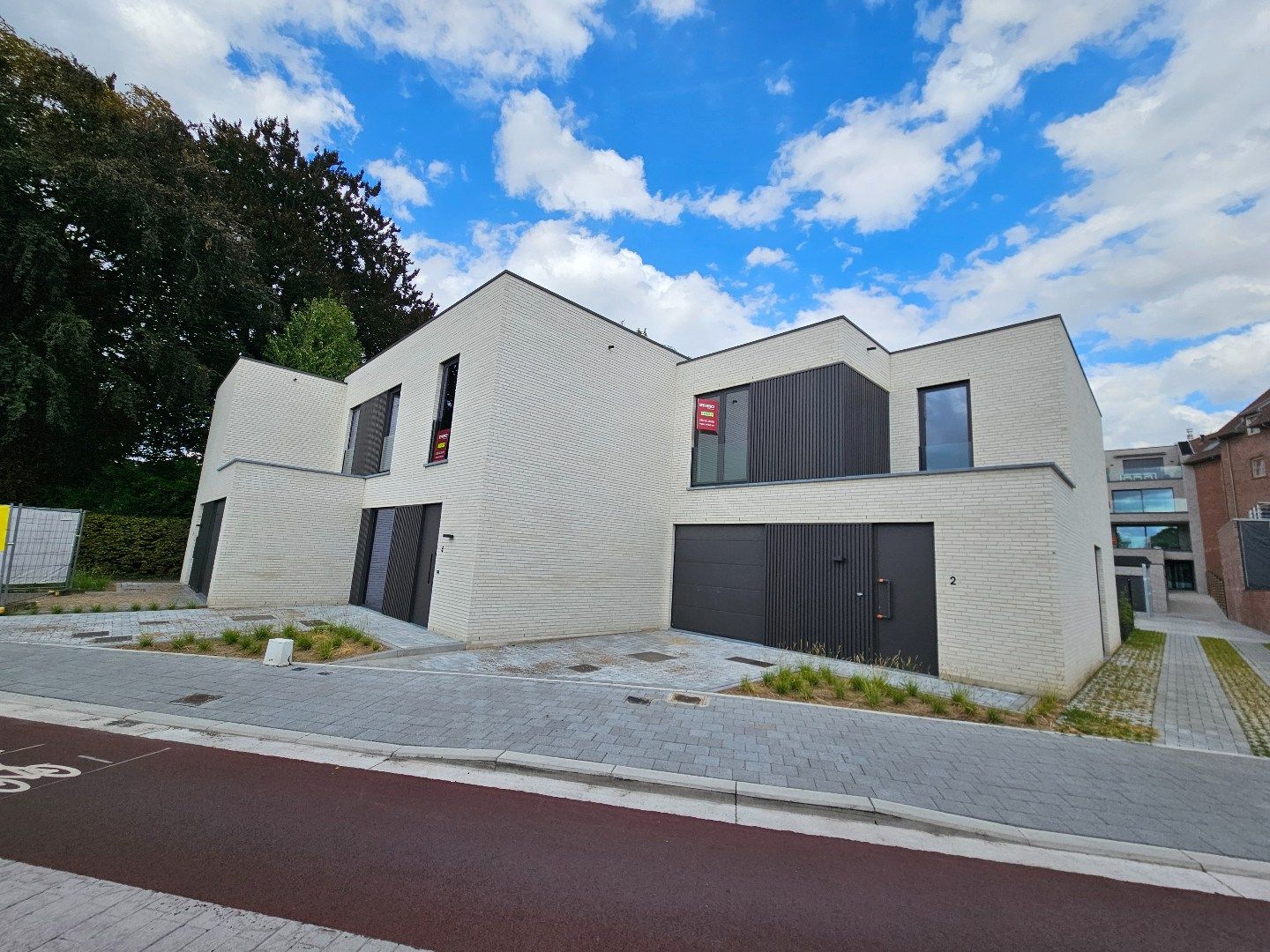 Instapklare nieuwbouwwoningen in hartje Harelbeke foto {{pictureIndex}}