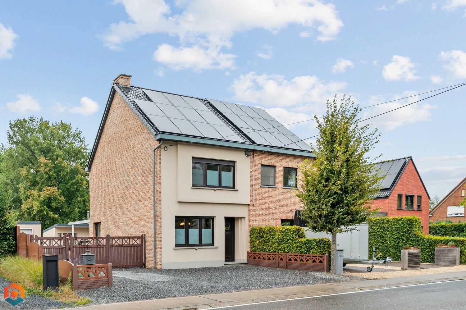 Verzorgde woning met 2 slpkrs, leuke tuin en garage foto {{pictureIndex}}