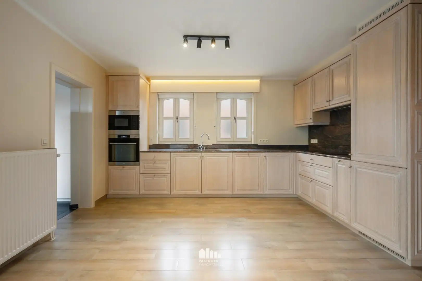 Instapklare, energiezuinige woning met tuin en dubbele garage in hartje Voormezele foto 11