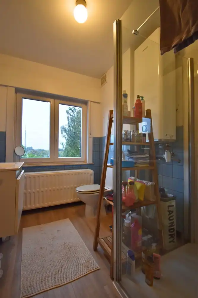 ruime bel-étagewoning met 3 slaapkamers, garage en tuin in het centrum van Sint-Pieters-Leeuw foto 8