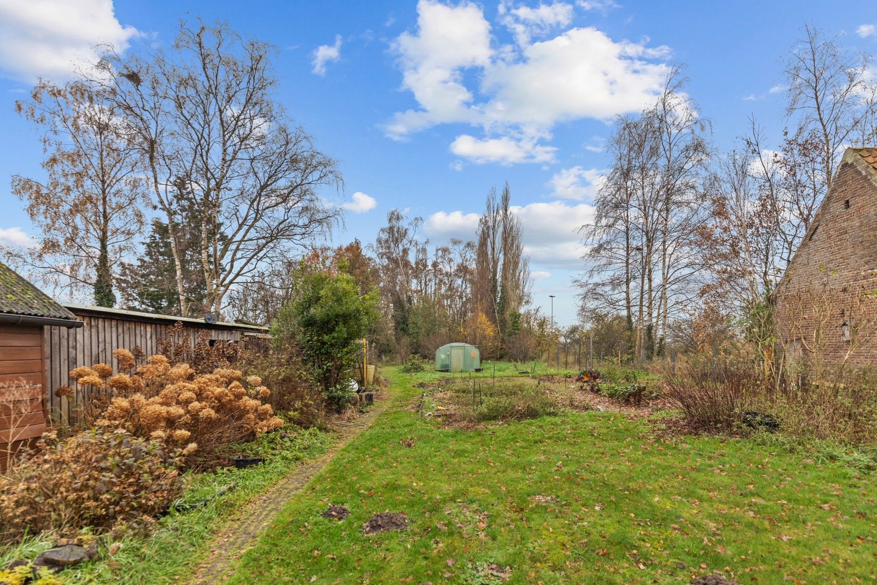 Charmante woning met mogelijkheden op een zeer ruim perceel! foto 11