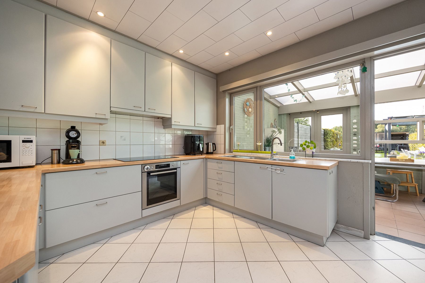 Charmante en goed onderhouden woning met 2 à 3 slk + garage foto 10