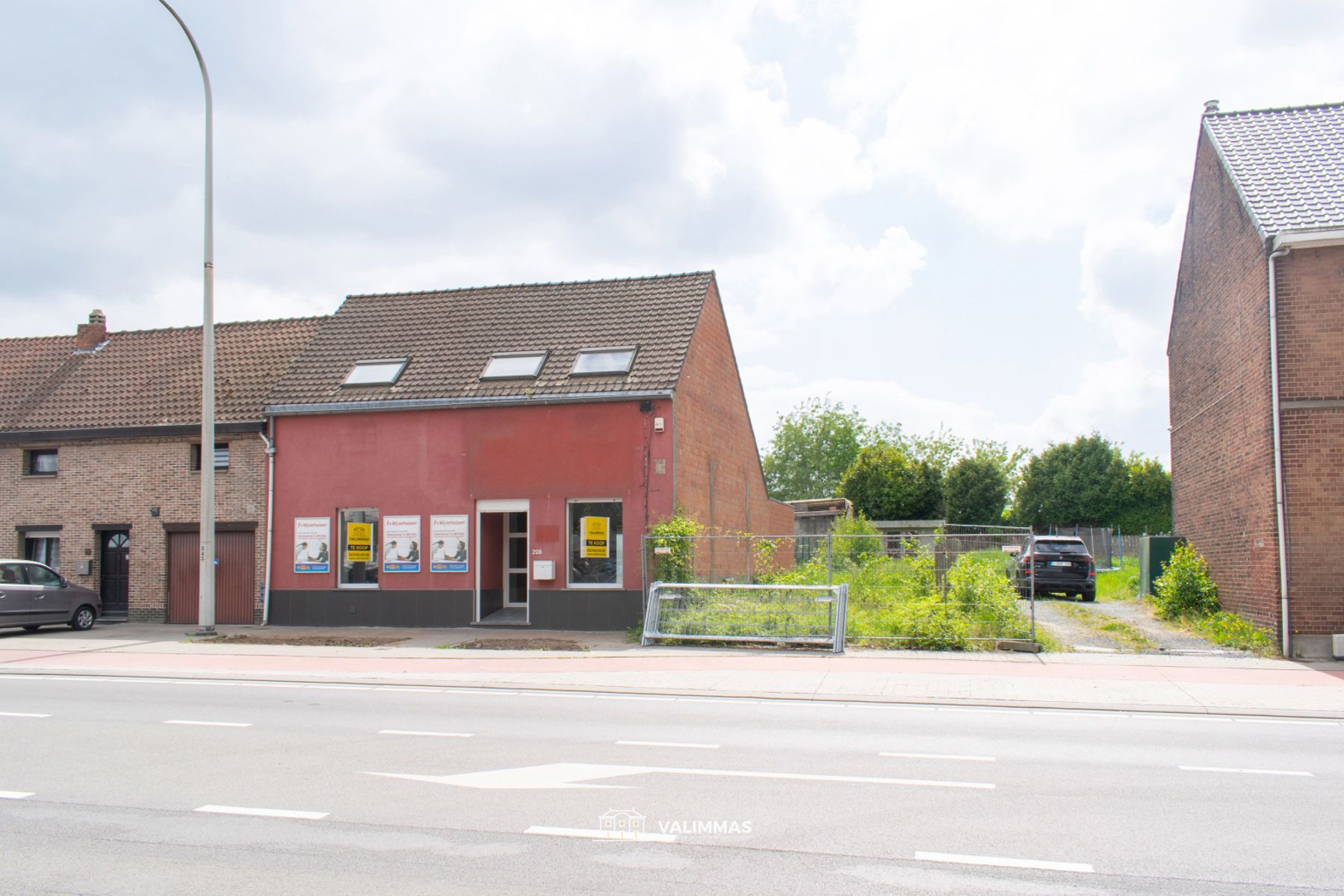 Commercieel gelegen (handels)woning met tuintje... foto 2