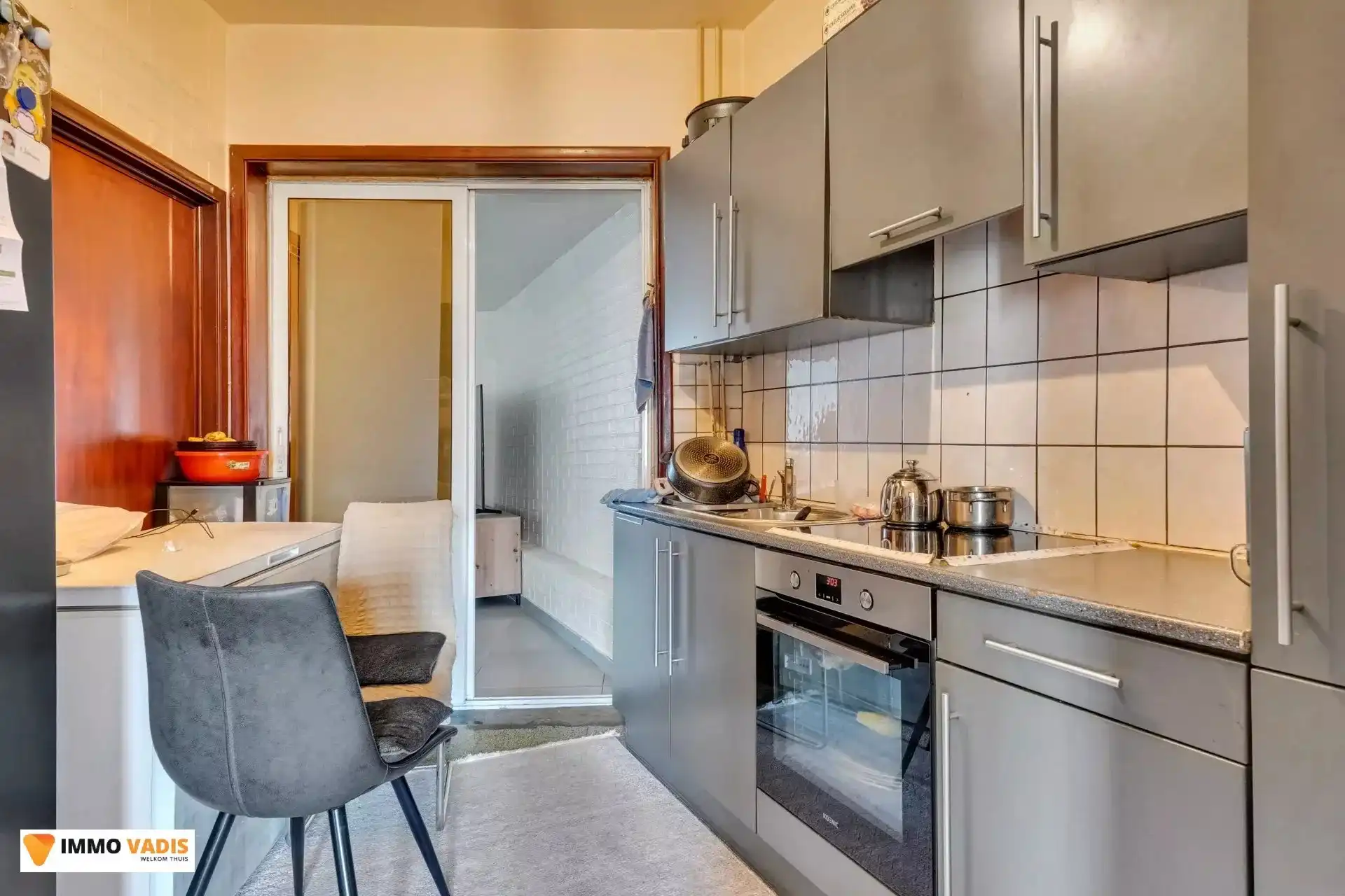 Handelspand met woonst en naastliggende woning foto 15